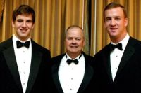 Coach Cutcliffe with Manning Brothers